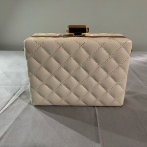 Elegant Cream Quilted Clutch